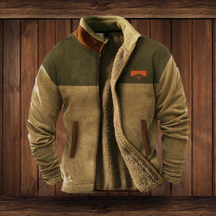 Full-length view of a men's stand collar zip jacket with bold southwestern patterned sleeves.