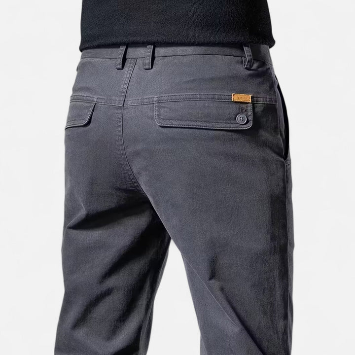 Outfit inspiration: Men's tailored straight-leg trousers paired with a dress shirt.