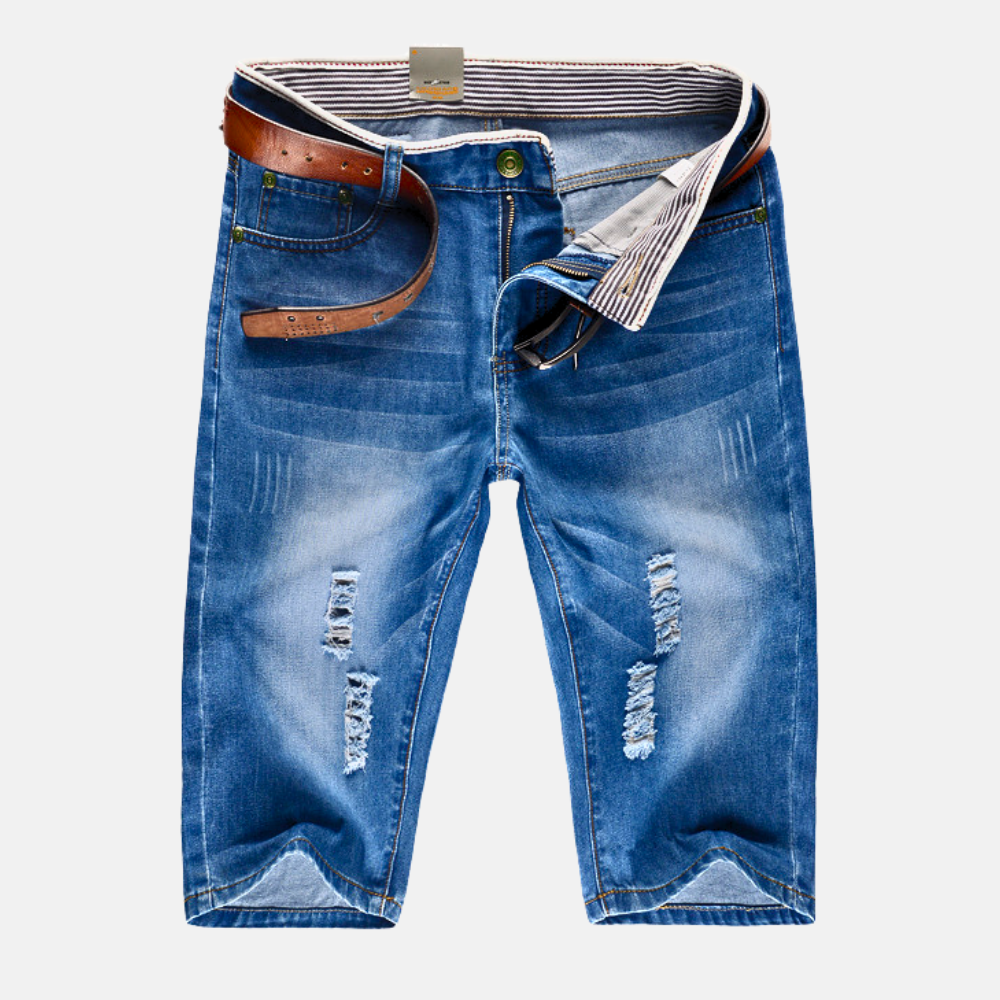 Men's streetwear distressed denim shorts with rips, ideal for urban casual summer fashion.
