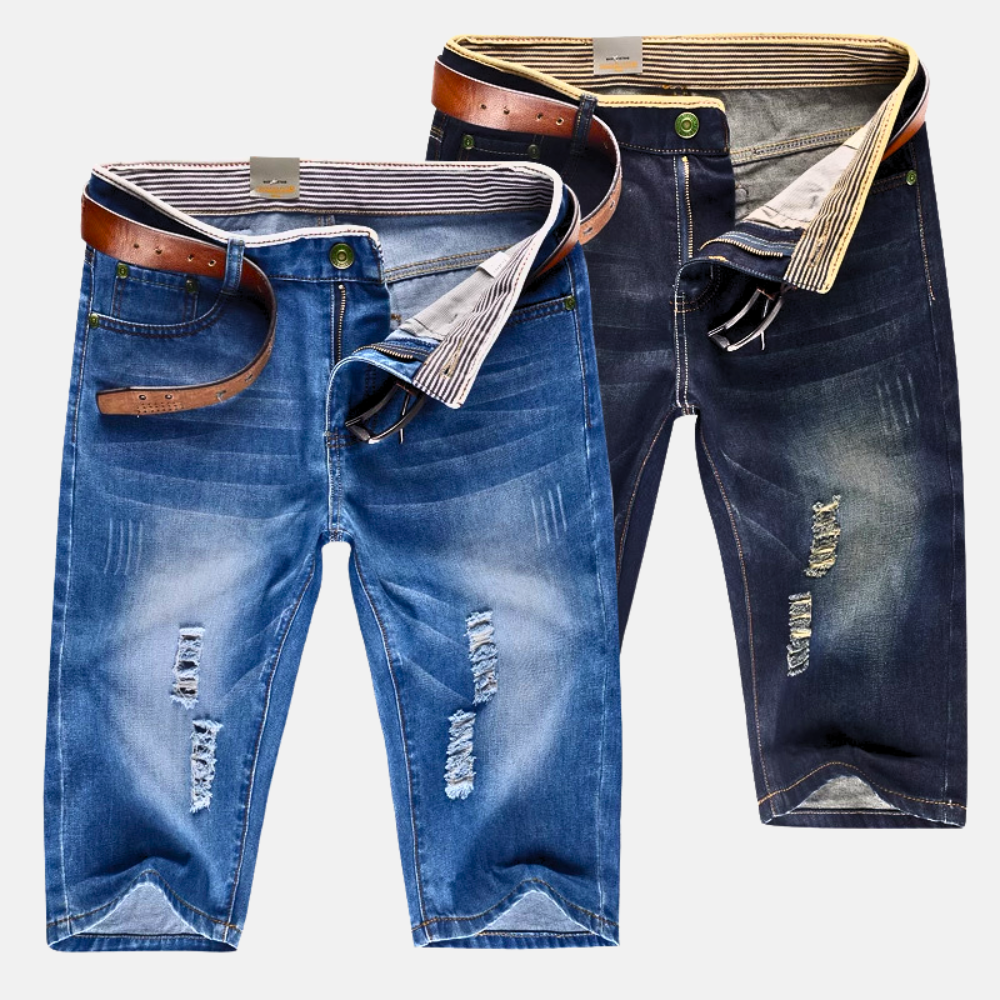 Urban style men's distressed denim shorts, featuring rips for a cool streetwear vibe.