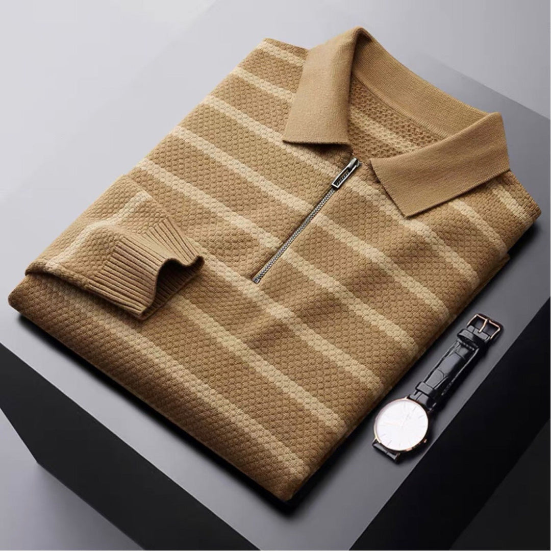 Stylish men's striped half-zip polo shirt. Versatile long sleeve knit top for elevated casual fashion.