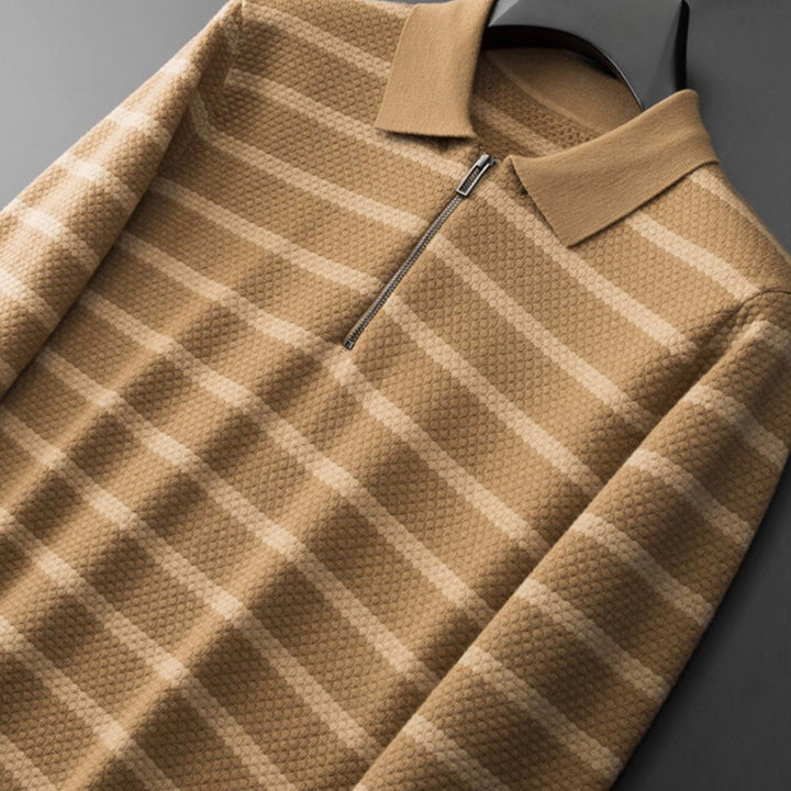 Comfortable men's striped half-zip polo shirt with a relaxed fit. Ideal long sleeve casual knit top.