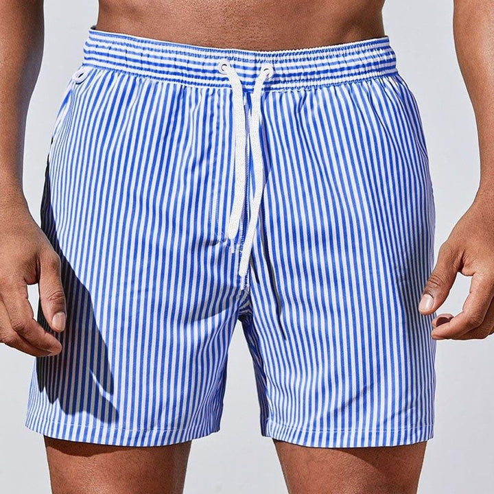 Men's striped swim shorts for beachwear & summer vacations. Comfortable mid-thigh swimwear with adjustable drawstring.