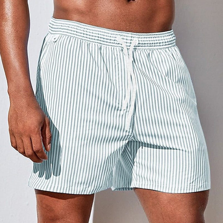 Comfortable men's striped swim shorts with adjustable drawstring. Perfect mid-thigh beachwear for summer & vacation.