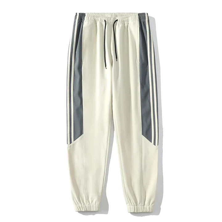 Effortless style men's striped tracksuit, perfect for active comfort. Includes jacket & joggers.