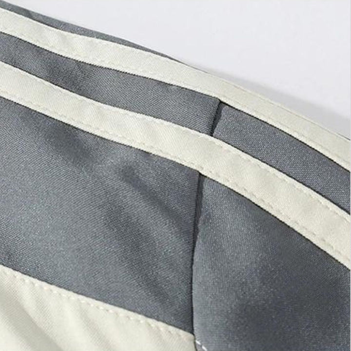 Men's striped sportswear tracksuit, ideal for active men seeking comfort & style in a two-piece set.