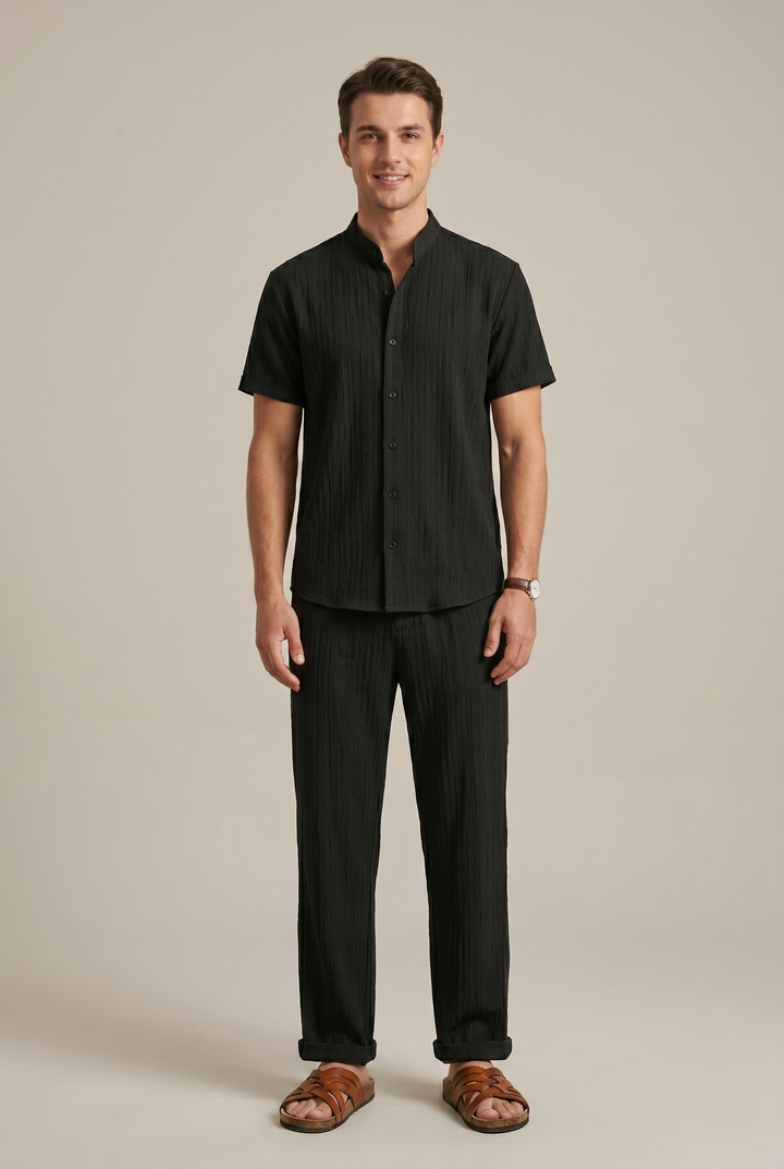 Men's striped two-piece outfit set, featuring a casual shirt & matching trousers for effortless style & comfort.