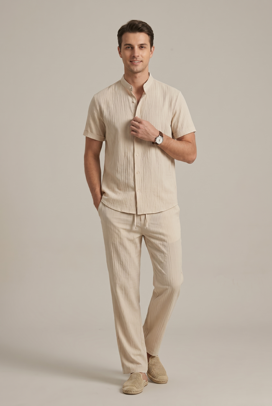 Stylish men's smart casual striped shirt and coordinated trousers set, perfect for a modern, relaxed outfit.