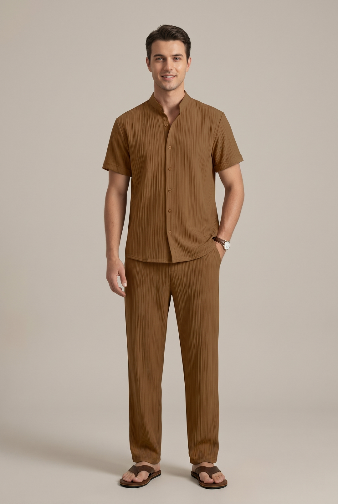 Full shot of a man wearing a comfortable striped two-piece outfit, ideal for a casual yet refined everyday look.