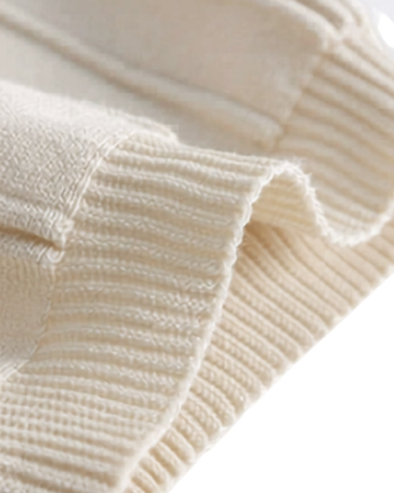 Close-up of men's striped zip-up polo shirt. Highlights ribbed knit texture, short sleeve, and smart casual design.