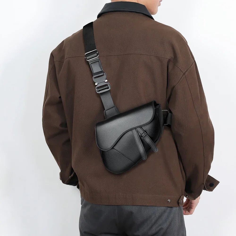 Sleek men's structured saddle crossbody bag. Adjustable strap ensures comfortable shoulder wear for daily adventures.