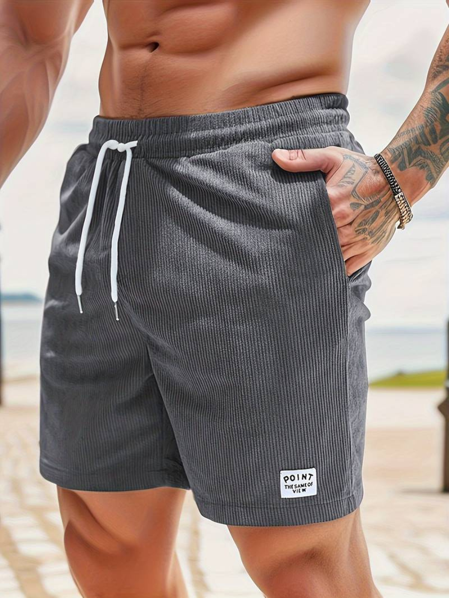 Full outfit shot featuring men's versatile active swim shorts.