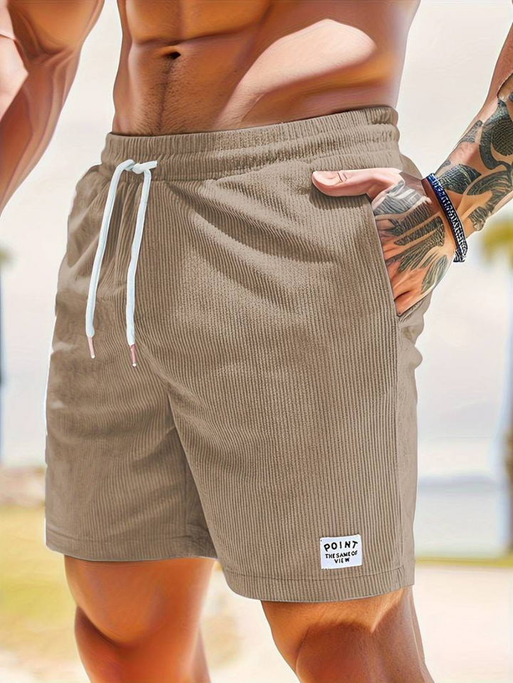 Close-up of the comfortable fit of DeHaan Mode men's active swim shorts.