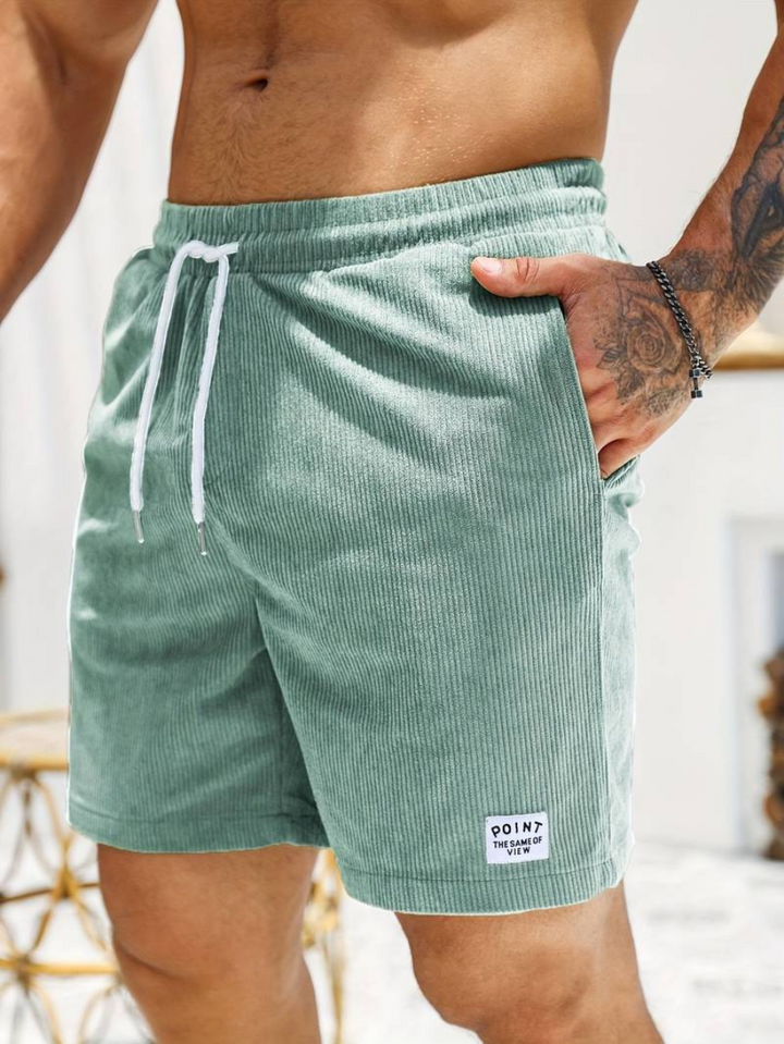 Men's black active swim shorts, ideal for swimming and casual wear.