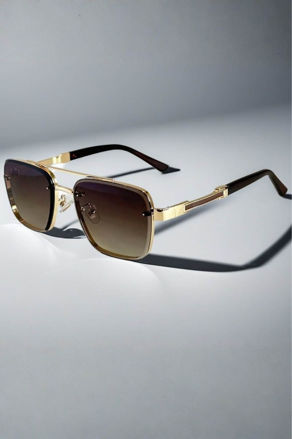 Contemporary men's gold metal aviator square sunglasses with gradient lenses. Essential casual eyewear.