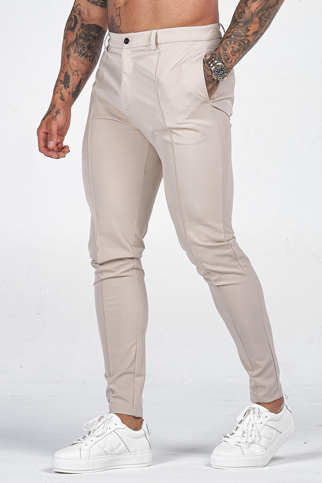 Men's stylish beige slim fit chino trousers, perfect for smart casual or formal occasions. Comfortable daily wear.