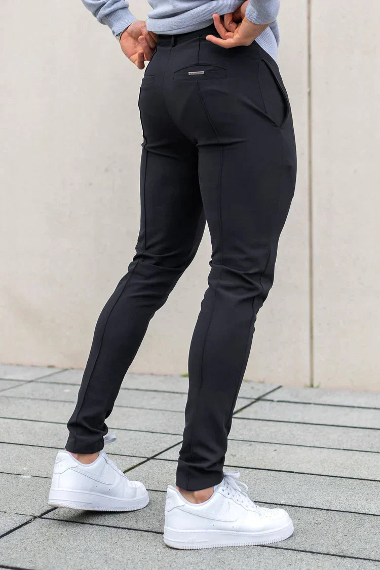 Modern gray men's trousers with a sleek slim fit, designed for comfort and style in any setting.