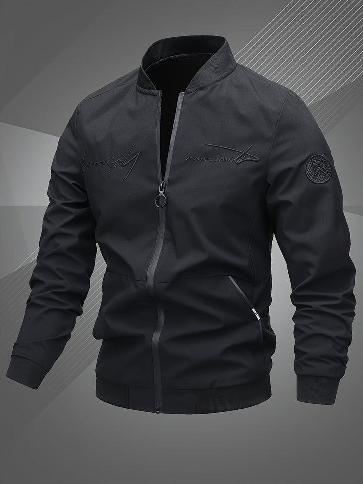 Detailed shot of the zipper and ribbed cuffs on a men's stylish bomber