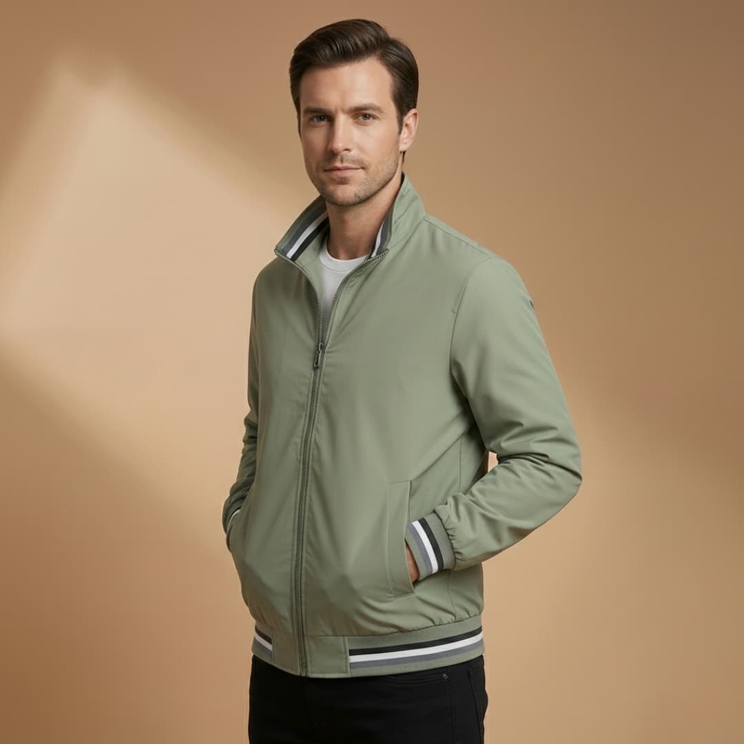 Full body shot of a man wearing a chic men's bomber jacket with a distinct stand collar and zip closure.