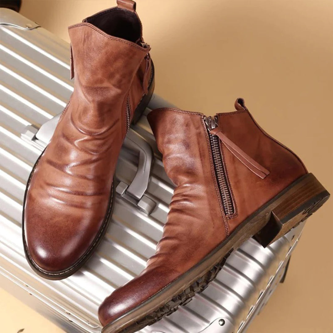 Men's stylish black zipper boots for all-season wear, offering comfort & a sleek modern design.