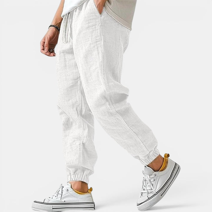 Men's stylish breathable drawstring pants, perfect for casual summer wear and everyday comfort.