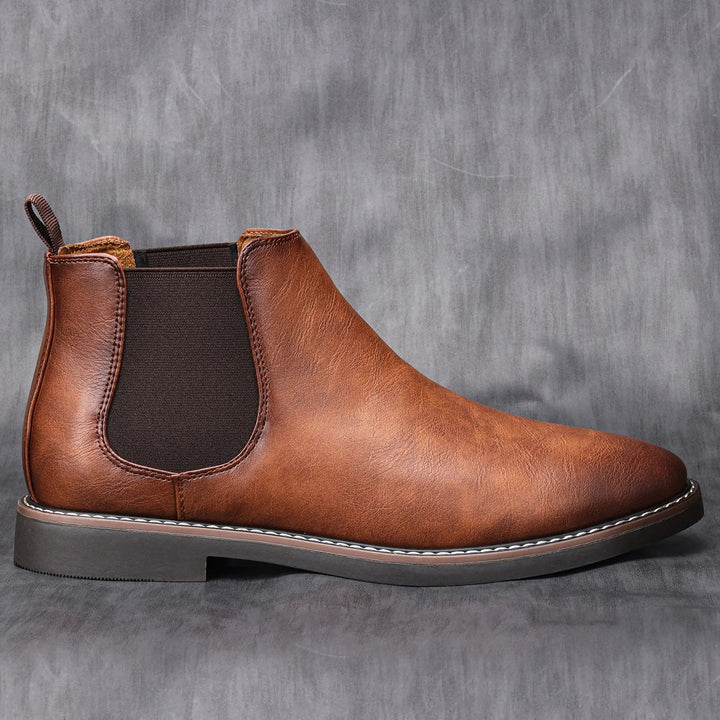 Versatile men's dressy ankle boots, sleek design, suitable for formal or smart casual fashion.