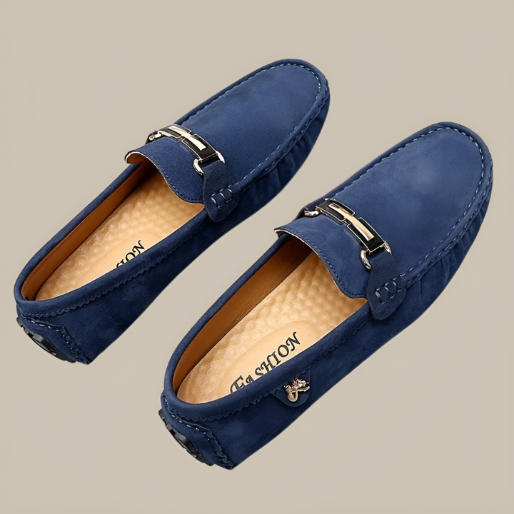 Classic grey suede slip-on moccasins for men, featuring soft sole and easy slip-on style.