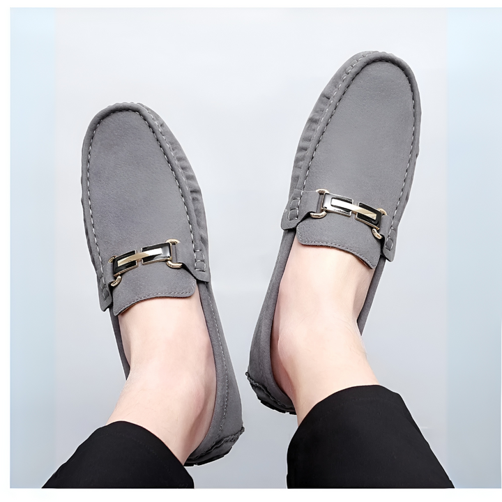 Fashionable men's blue suede driver moccasins, perfect slip-on casual footwear for modern menswear.