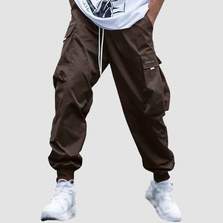 Modern men's cargo pants, ideal for casual wear. Stylish, comfortable & utility-focused for any season.