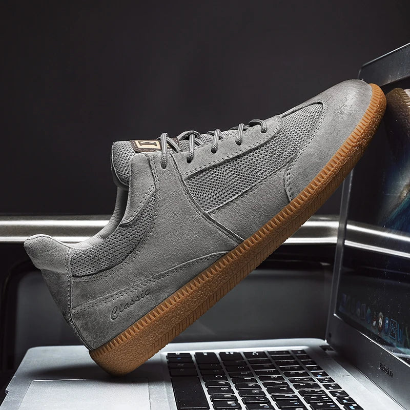 Modern vintage gray men's casual shoes for stylish everyday comfort. Lace-up design with superior grip.
