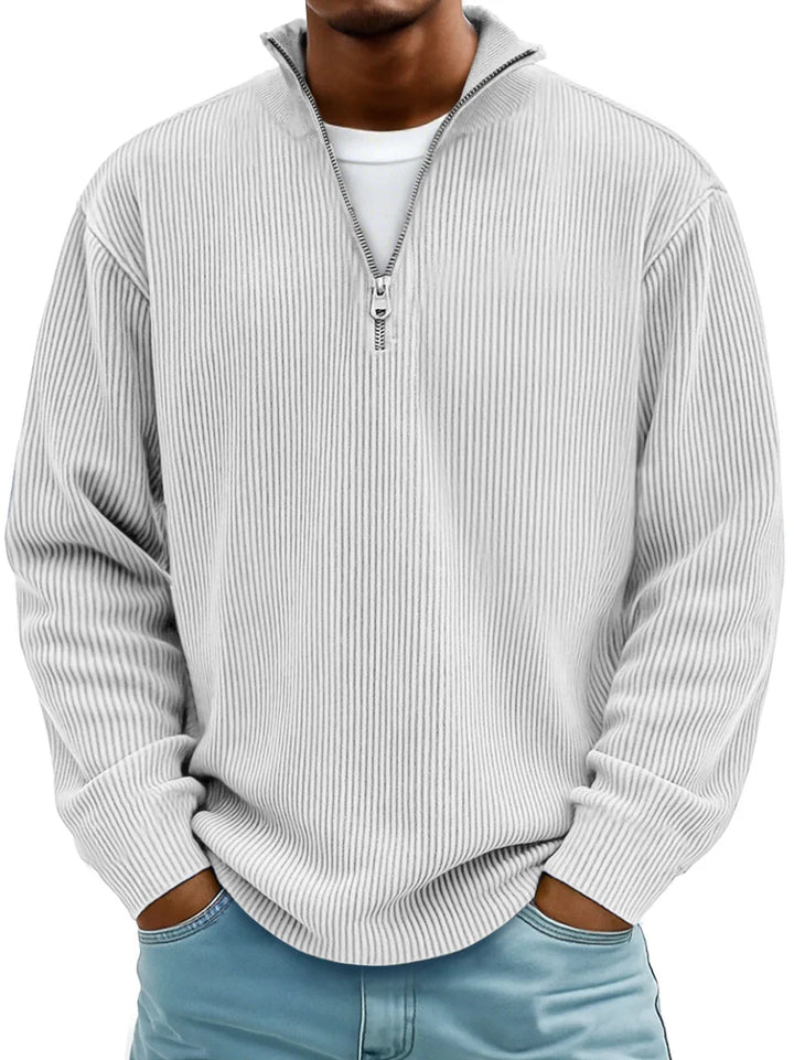 Ribbed knit men's sweater featuring a trendy half-zip design. Stylish casual long sleeve pullover.