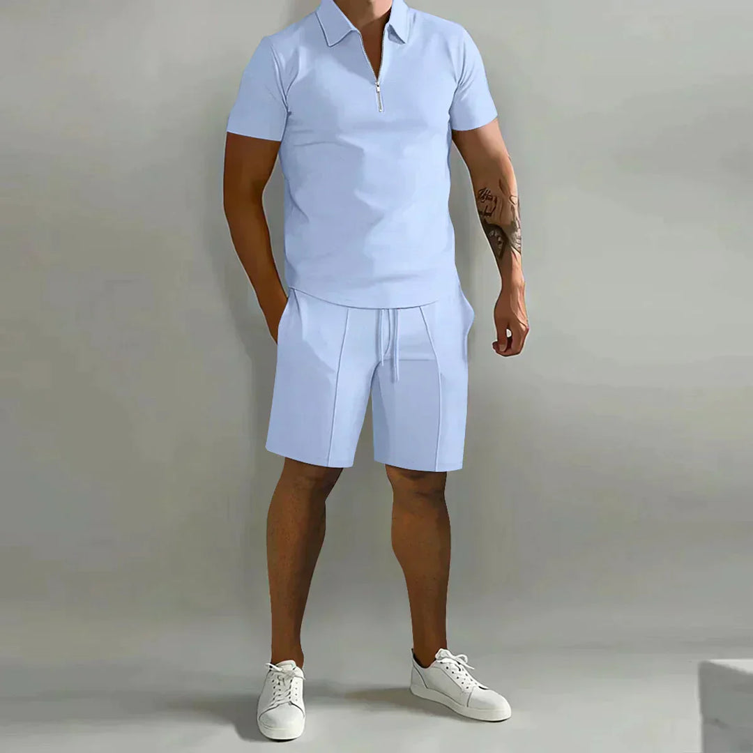 Comfortable men's casual co-ord set featuring a zip-neck polo shirt and matching shorts for summer leisure.