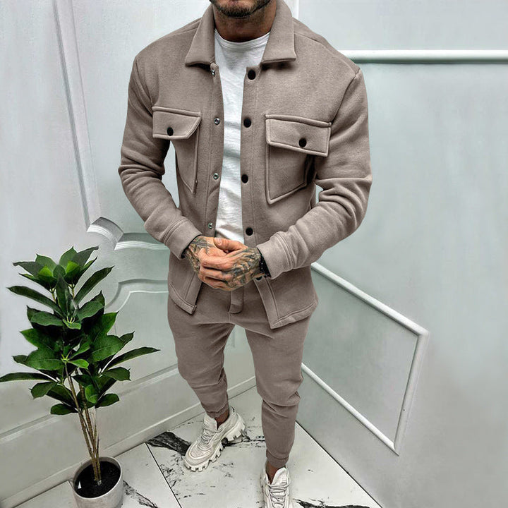 Man modeling a versatile men's casual smart shirt & trousers set, perfect for a relaxed yet polished look.