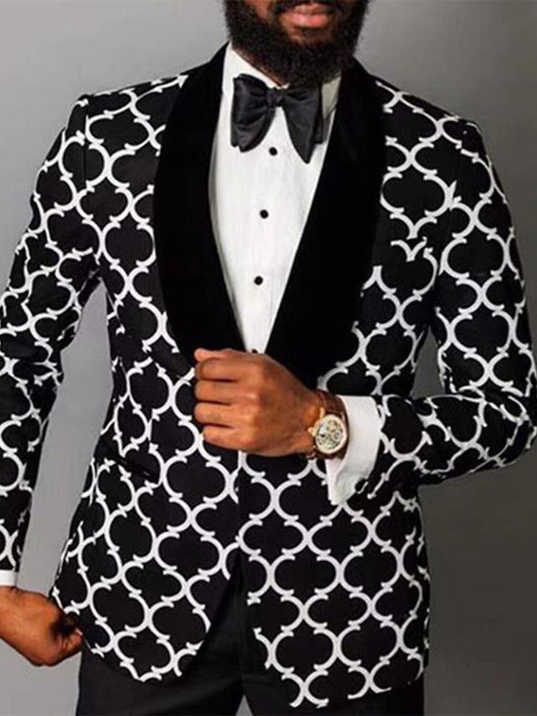 Men's stylish checkered single-breasted suit, perfect for formal wear, business attire, or smart casual elegance.