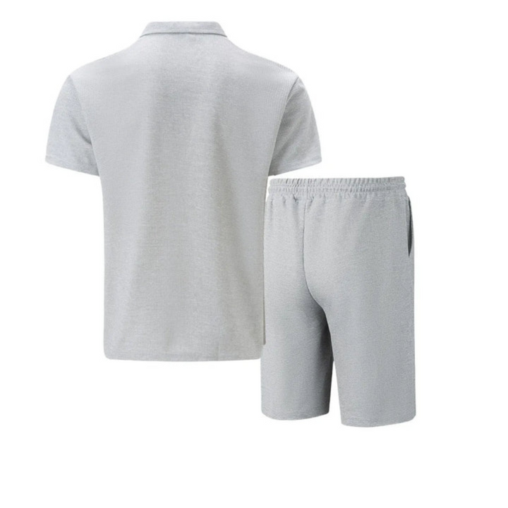 Men's stylish co-ord set: zip polo shirt & drawstring shorts. Perfect summer casual wear.