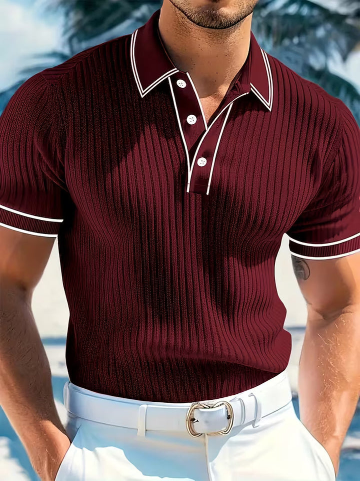 Stylish men's color-blocked short sleeve polo. Comfortable and versatile top for modern men's casual fashion.
