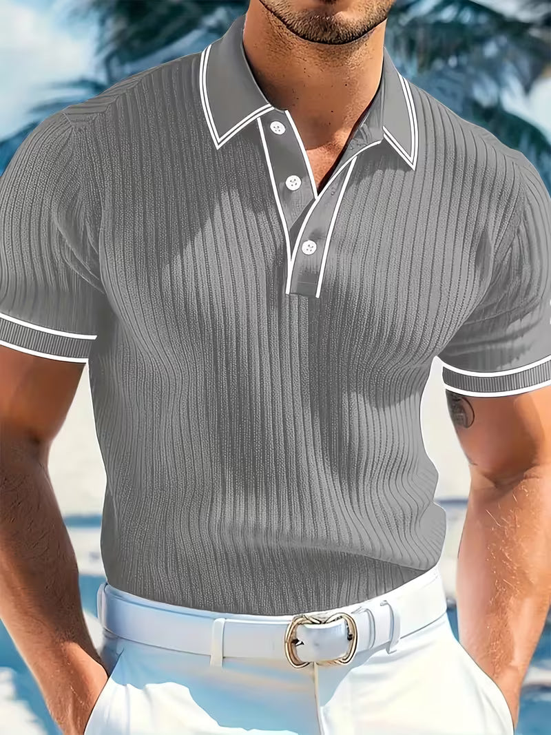 Fashion-forward men's color-blocked short sleeve polo. Comfortable and stylish top for a modern, versatile look.