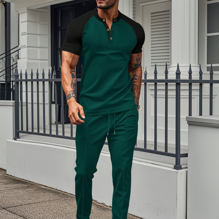 Stylish men's Henley shirt with contrast detailing from a comfortable two-piece jogger set. Ideal for casual wear.