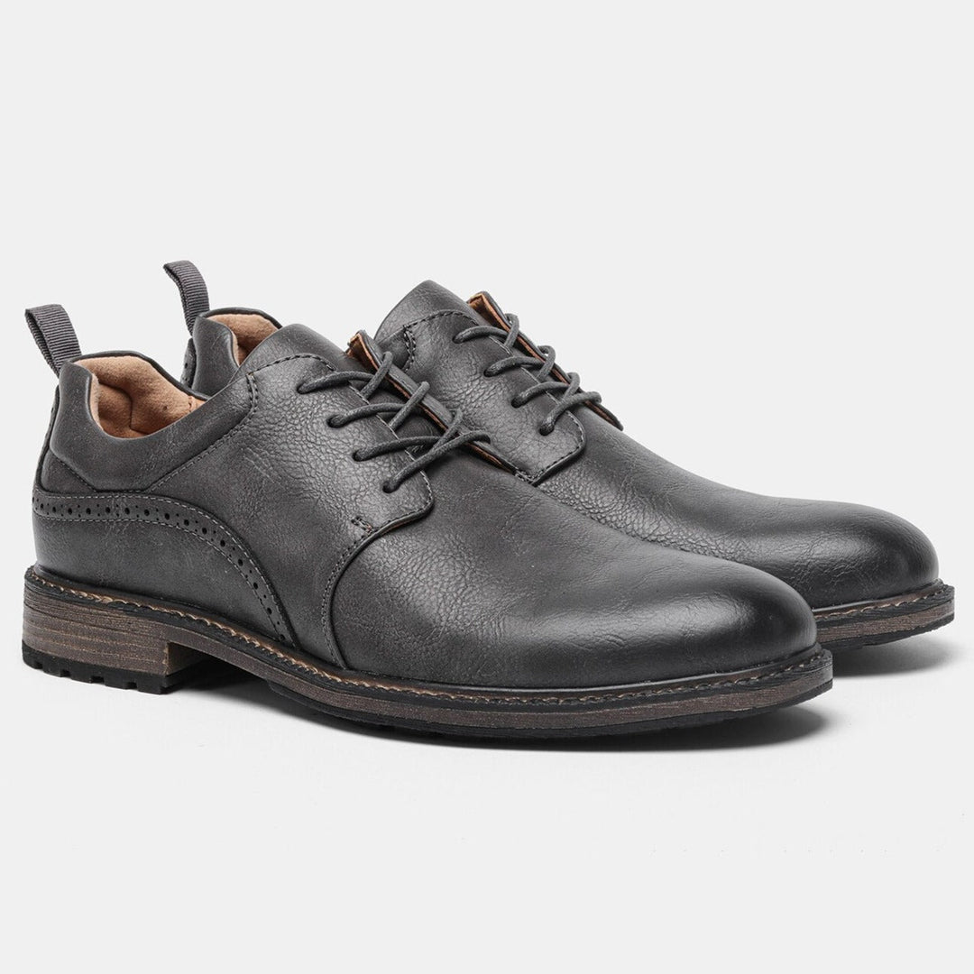 Men's casual dark grey boots. Premium booties designed for comfort, style, and excellent slip-resistant traction.
