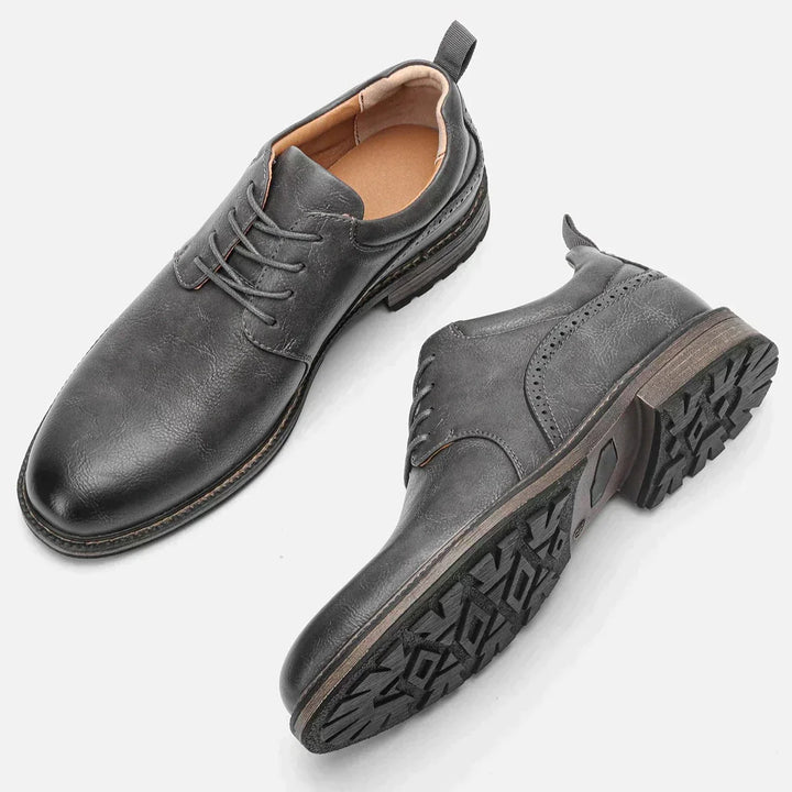 Premium men's dark grey booties. Elegant and comfortable footwear with a non-slip sole for daily wear.