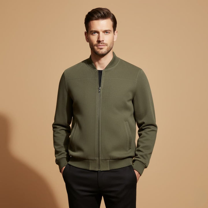 Close-up of men's bomber jacket, showing durable front zip closure. Versatile outerwear for spring & fall.
