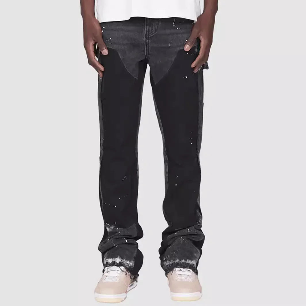 Men's stylish flared jeans with a unique layered look design, perfect for modern street style fashion.