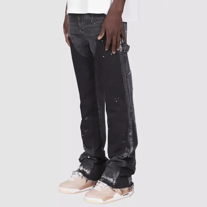 Stylish men's modern flared jeans, perfect for street style; comfortable layered look denim.