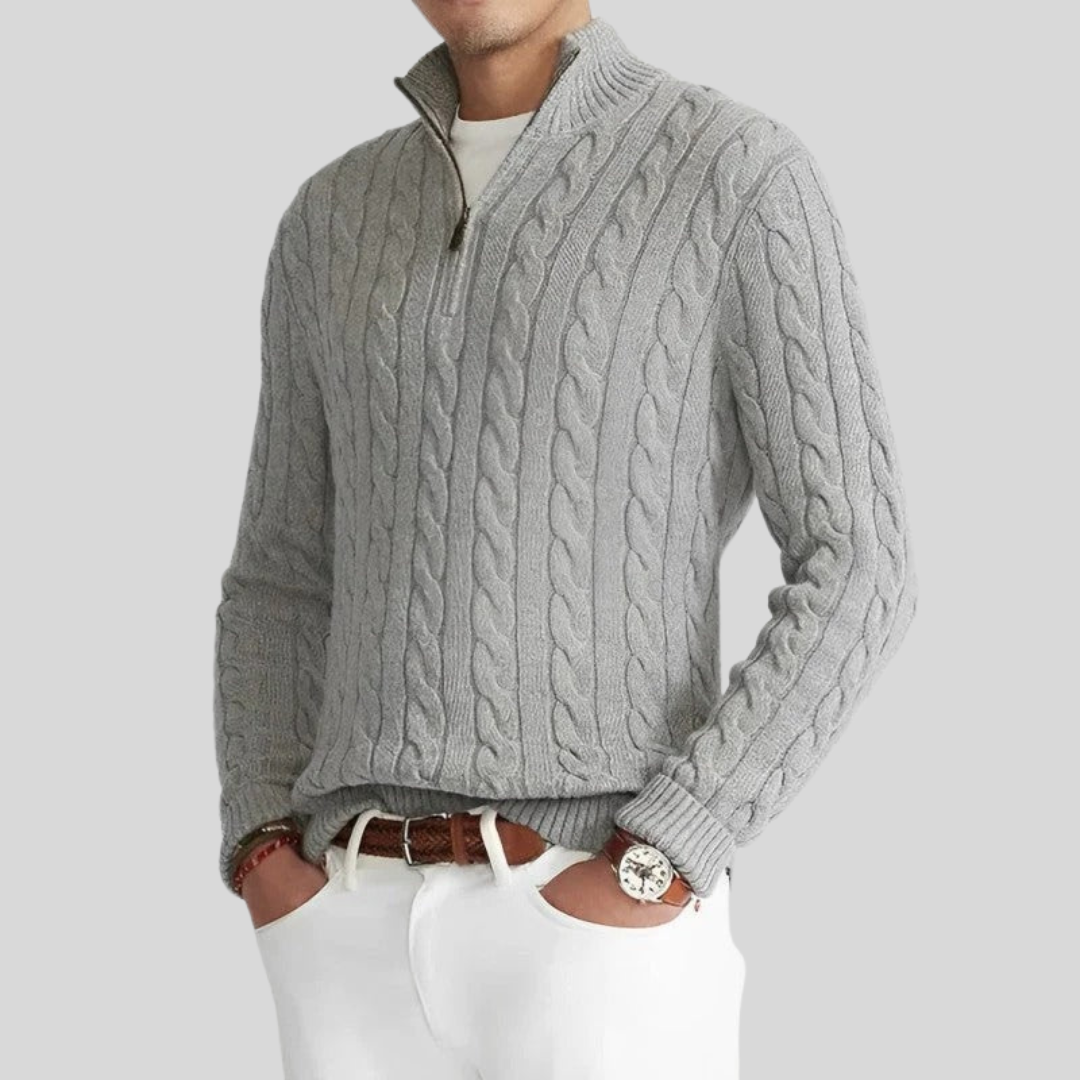 Men's stylish grey cable knit quarter-zip sweater with high collar, perfect for classic casual winter layering.