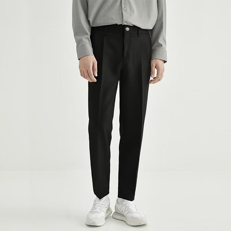 Men's stylish high-waisted pleated cropped dress pants with a modern straight-leg fit.