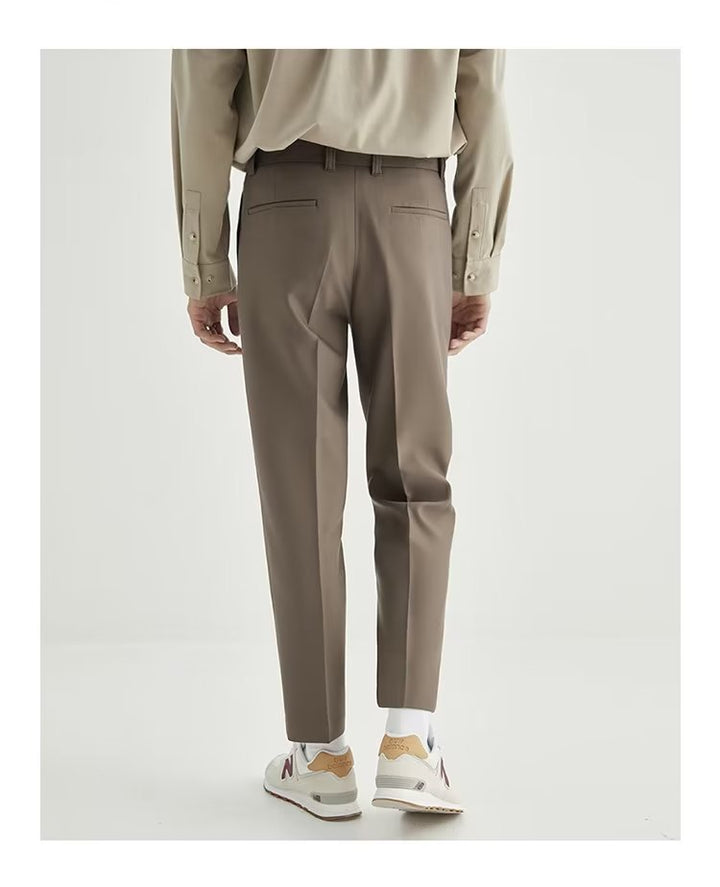 Men's smart casual high-waisted straight leg cropped pants, highlighting the modern ankle-length cut.
