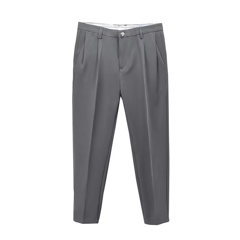 Men's stylish high-waisted pleated cropped pants in motion, demonstrating the comfortable straight-leg fit.