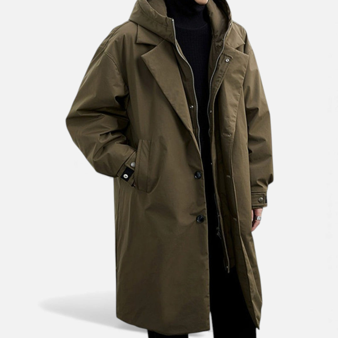 Man in a fashionable mid-length hooded trench coat, perfect for autumn & winter everyday wear.