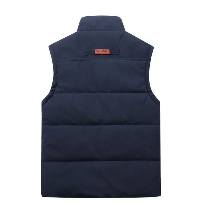 Versatile black men's sleeveless jacket, perfect for layering and modern men's fashion.