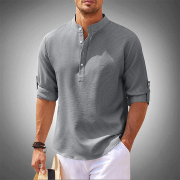 Men's stylish long-sleeve button-down shirt, tailored fit for spring/summer casual or semi-formal wear.